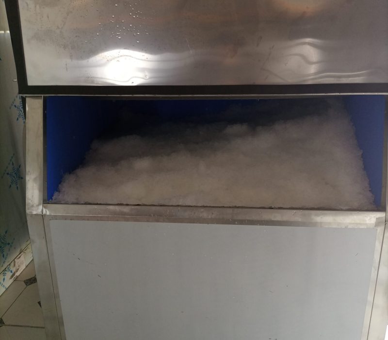 Ice flake machine filled with ice